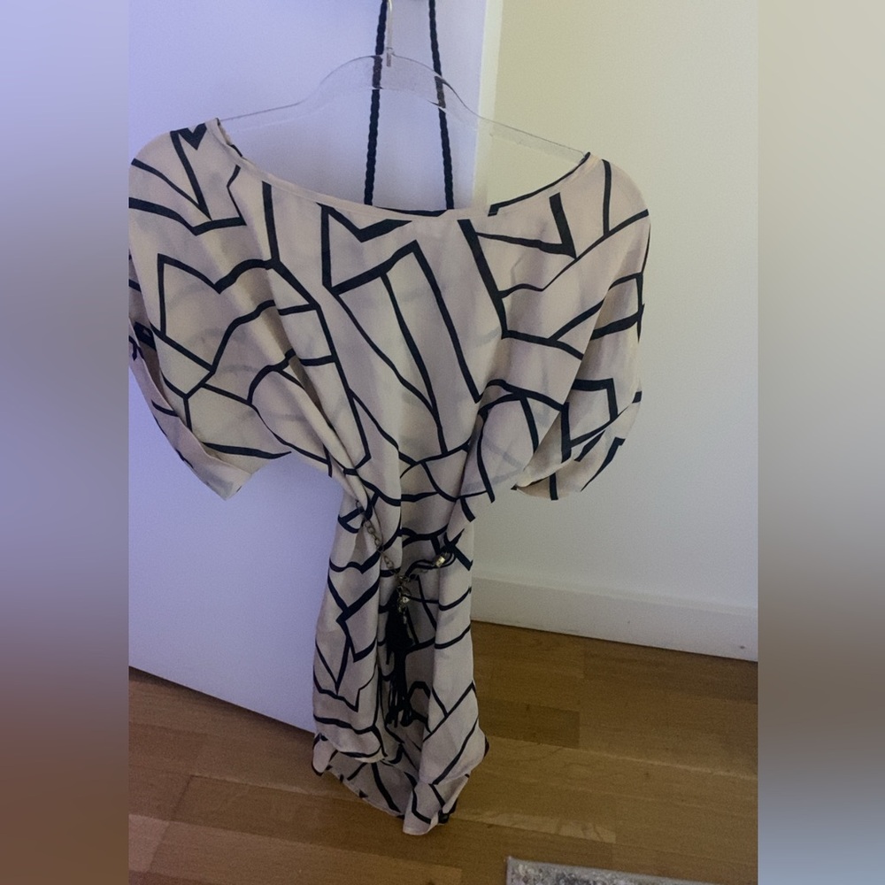 Geometric Patterned one shoulder long belted with Tassel blouse